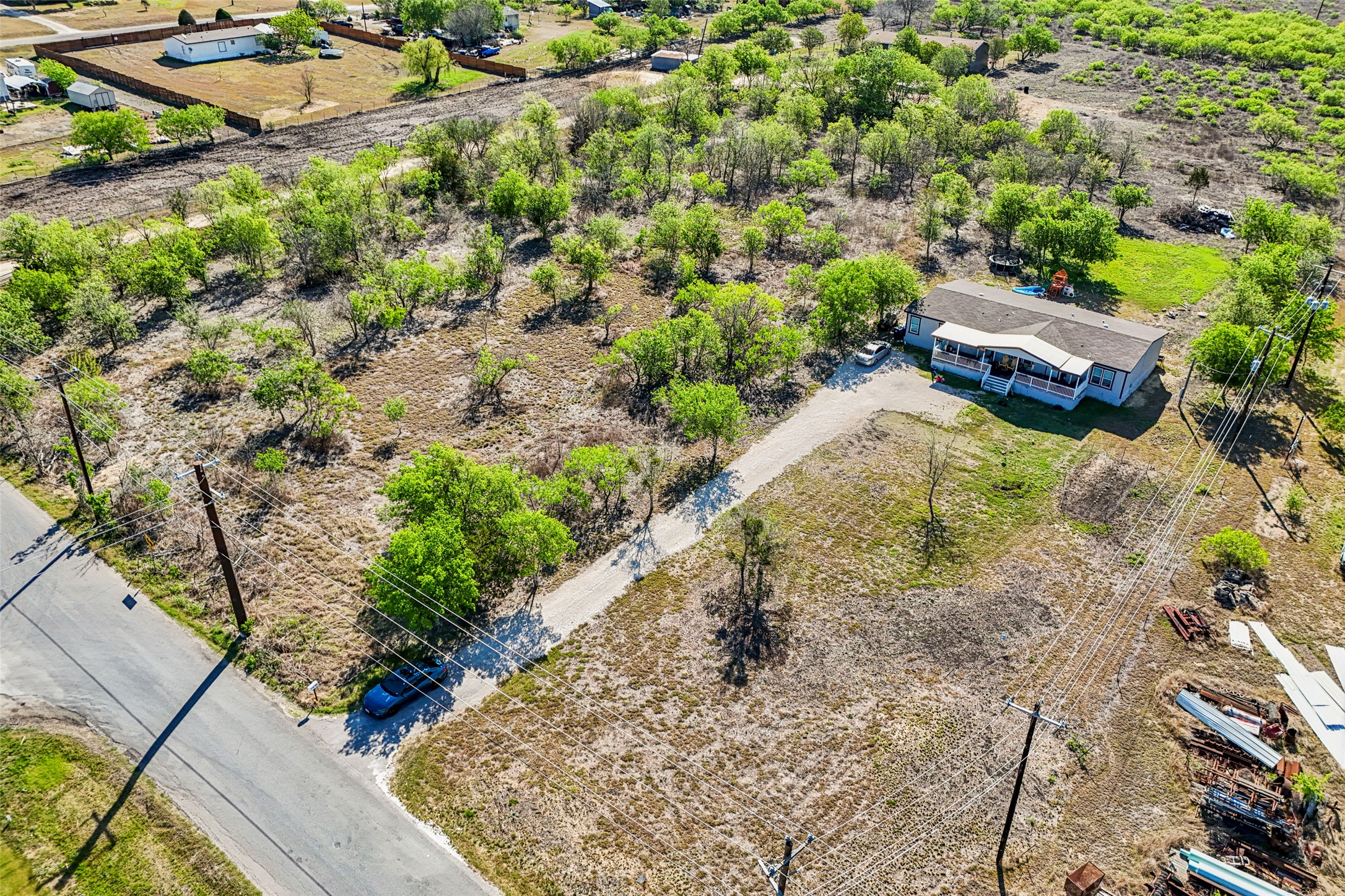 754 Williamson Road, Unit B Niederwald, TX 78640 - Photo 8 of 16 a view of a yard with plants