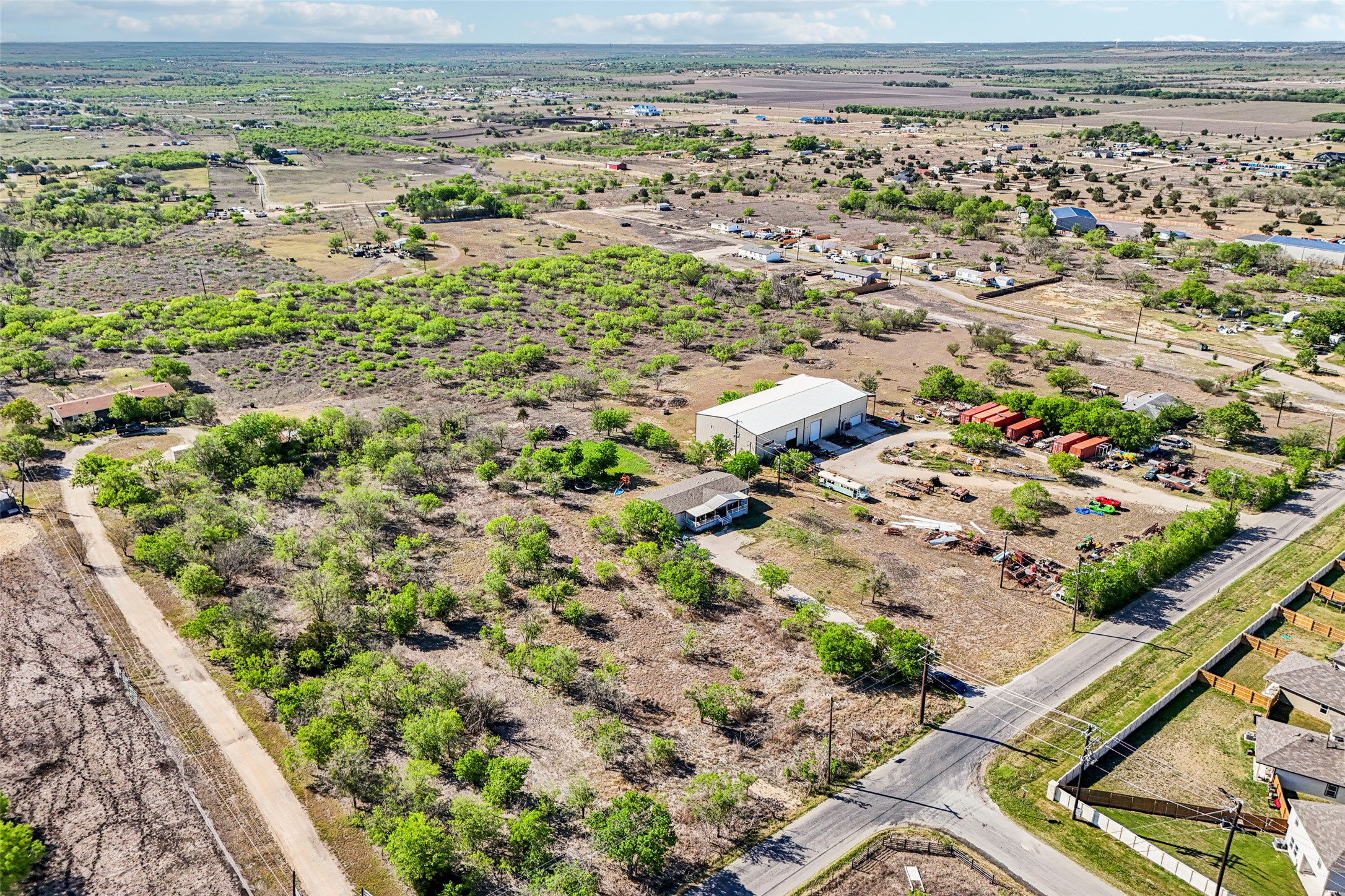 754 Williamson Road, Unit B Niederwald, TX 78640 - Photo 9 of 16 a view of a yard with a plant