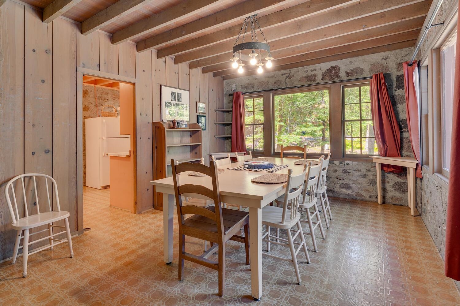 4715 Cedar Homewood, CA 96141 - Photo 11 of 25 a view of a dining room with furniture window and outside view