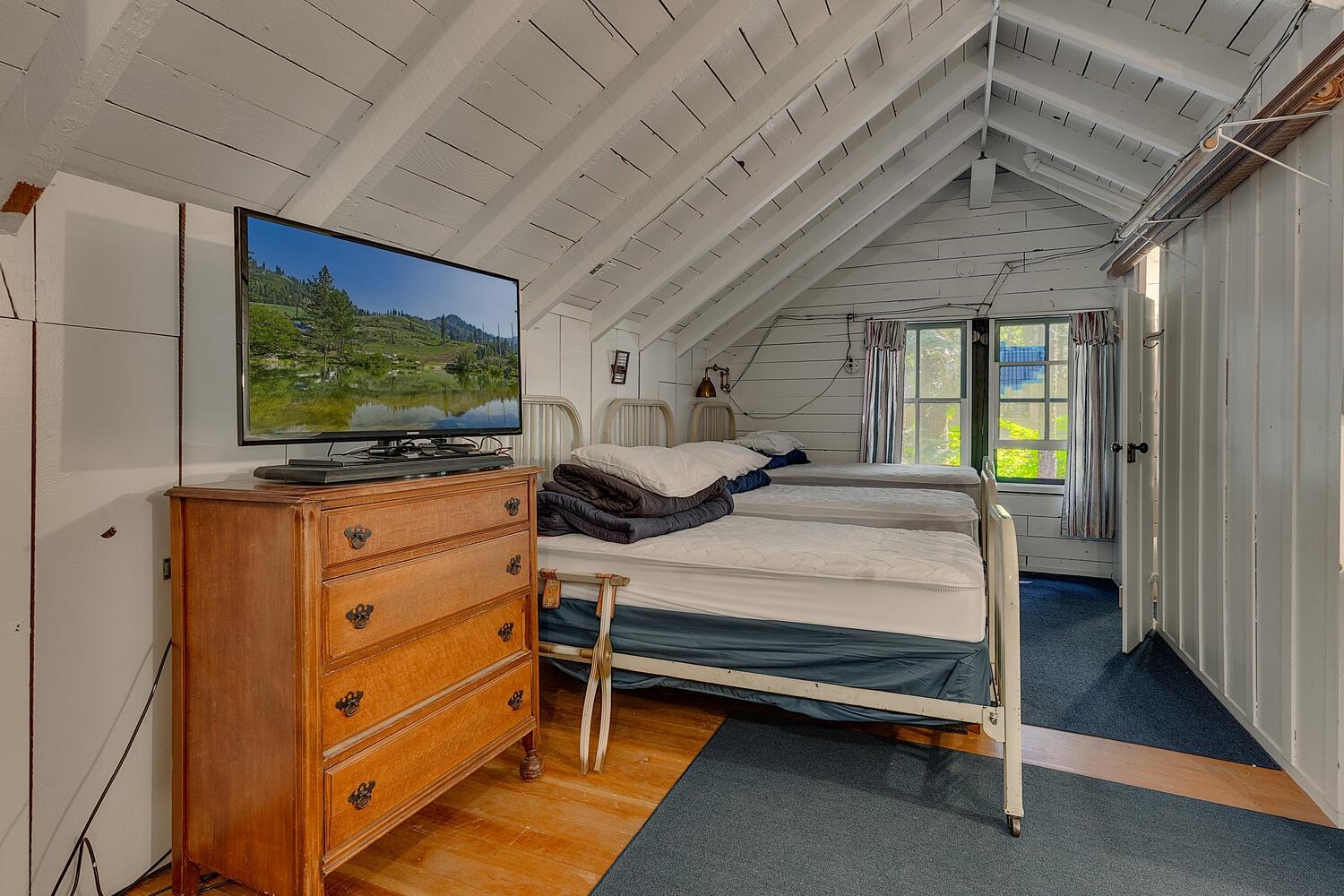 4715 Cedar Homewood, CA 96141 - Photo 24 of 25 a bedroom with furniture and flat screen tv