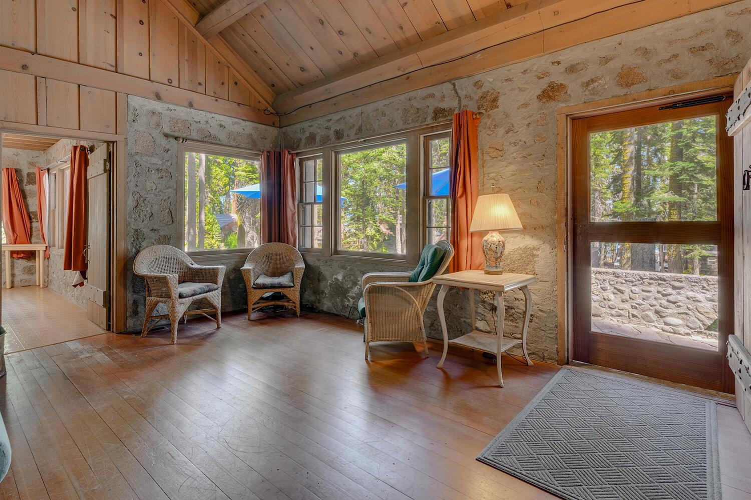 4715 Cedar Homewood, CA 96141 - Photo 10 of 25 a living room with furniture and a large window
