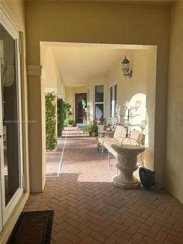 a view of a living room and bathroom
