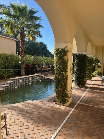 a view of a lake with a building in the background