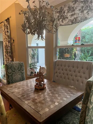 a view of a living room and kitchen