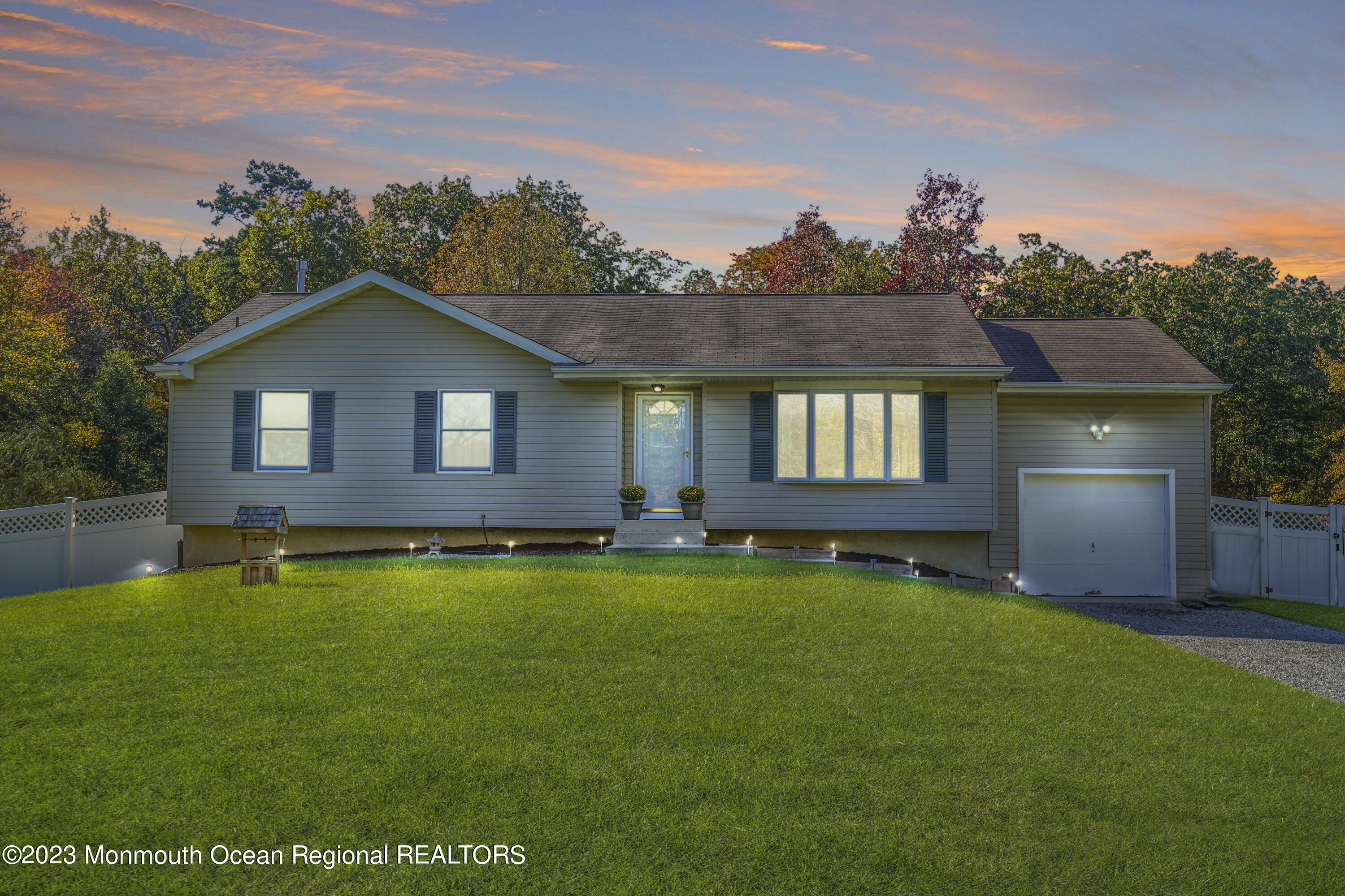 222 Leesville Road Jackson, NJ 08527 - Photo 1 of 61 a backyard of a house with table and chairs