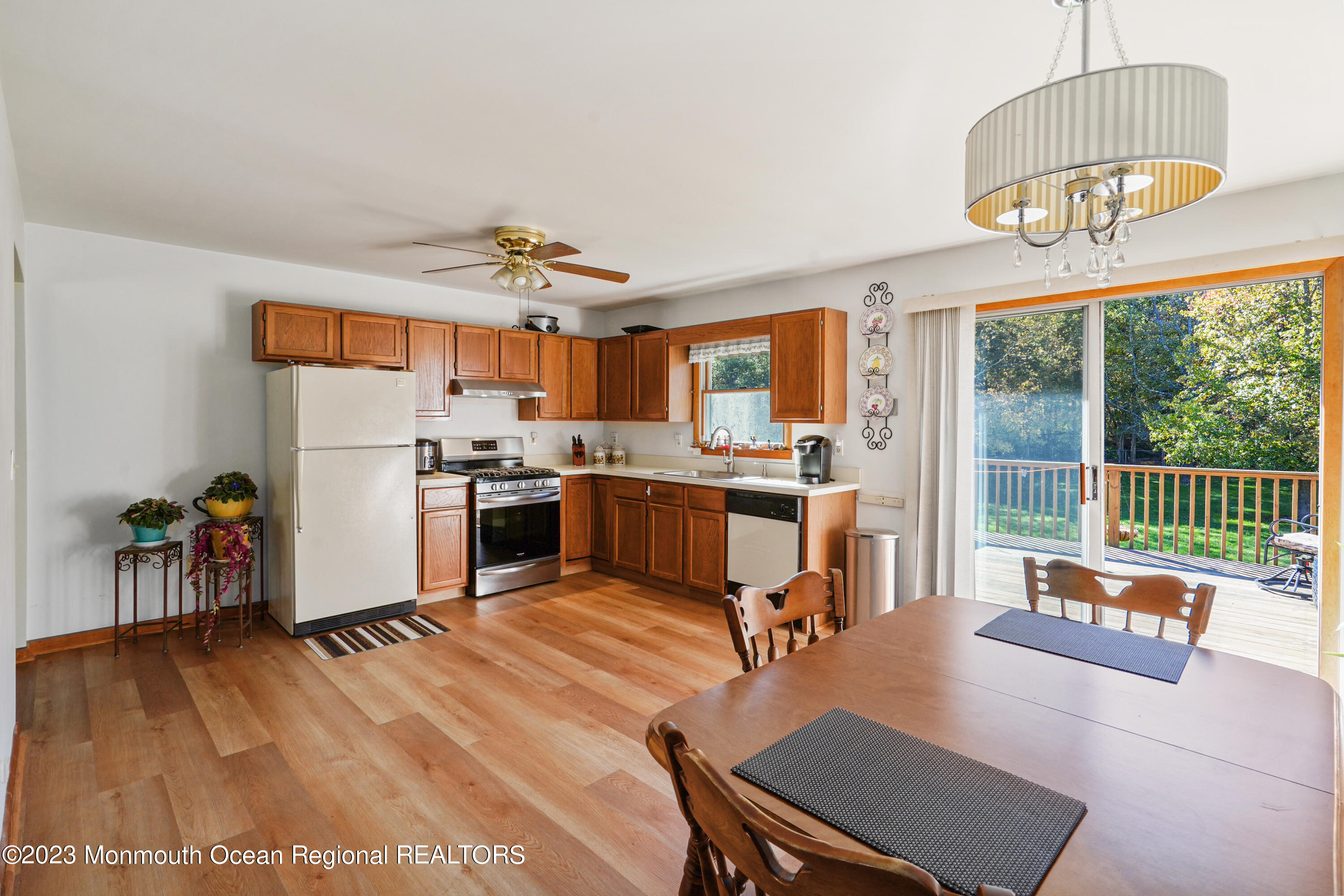 222 Leesville Road Jackson, NJ 08527 - Photo 16 of 61 a living room with stainless steel appliances kitchen island granite countertop furniture and a kitchen view