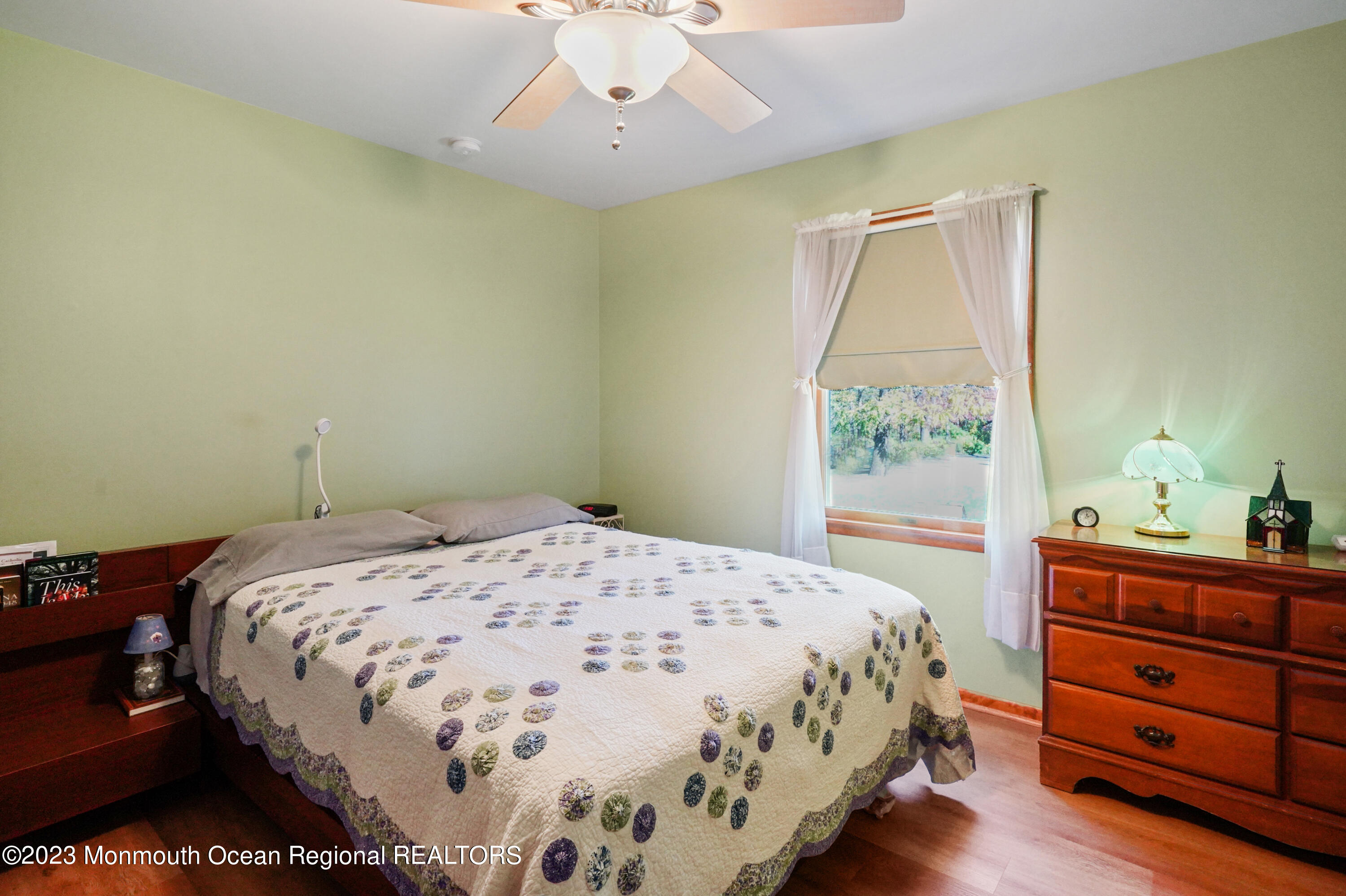 222 Leesville Road Jackson, NJ 08527 - Photo 19 of 61 a bedroom with a bed and a window