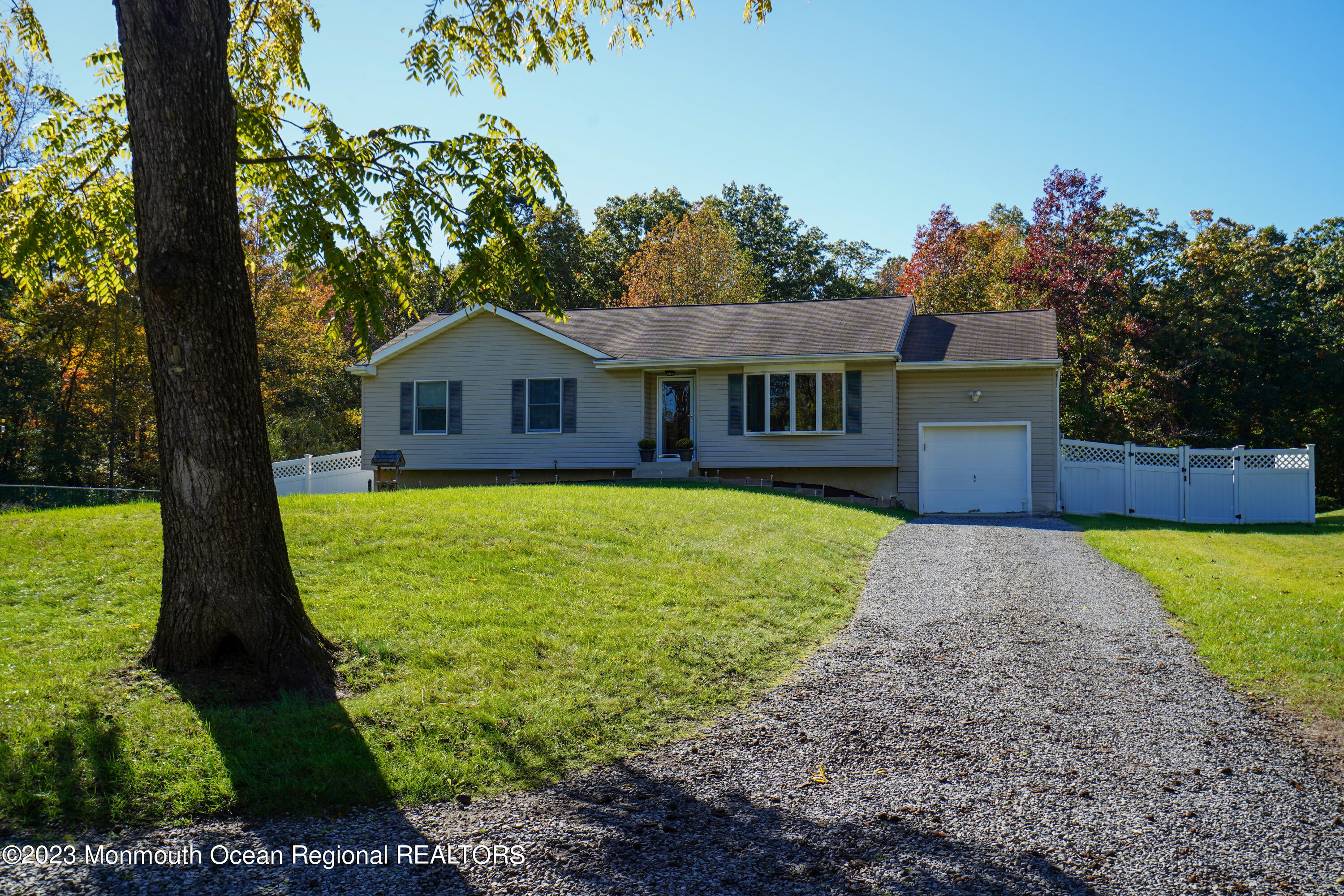 222 Leesville Road Jackson, NJ 08527 - Photo 3 of 61 a front view of a house with garden