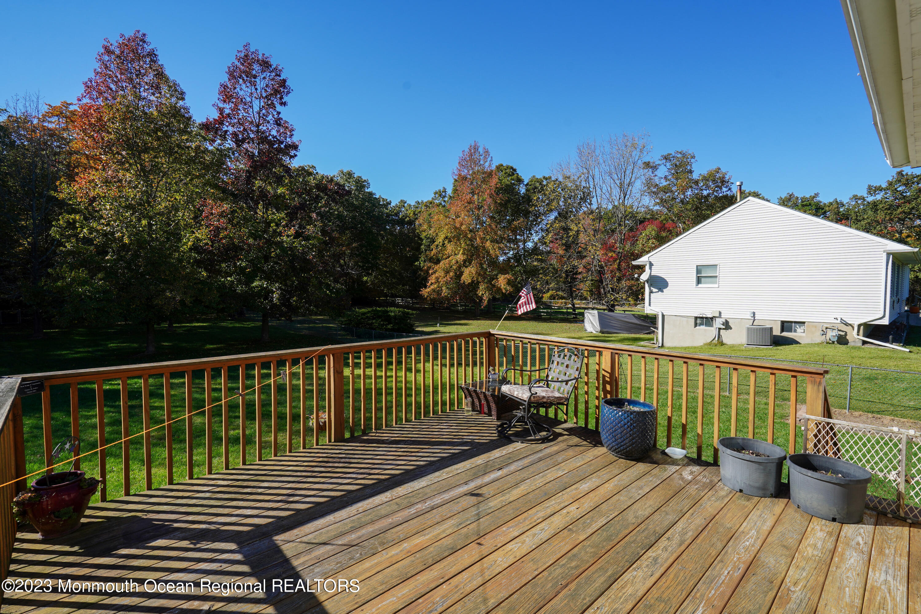 222 Leesville Road Jackson, NJ 08527 - Photo 32 of 61 a view of balcony with wooden floor and outdoor seating