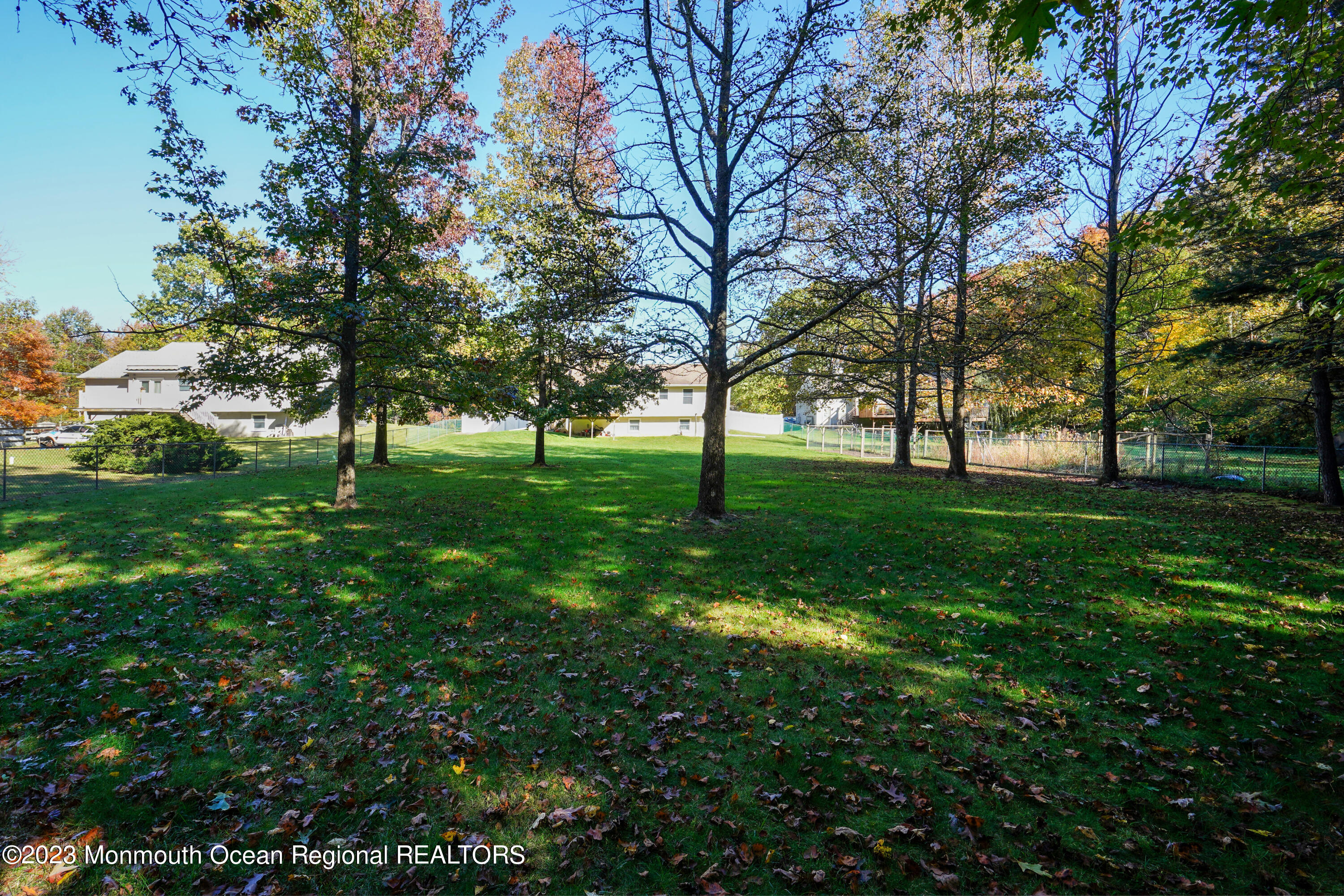 222 Leesville Road Jackson, NJ 08527 - Photo 41 of 61 a view of grassy field with benches and trees all around