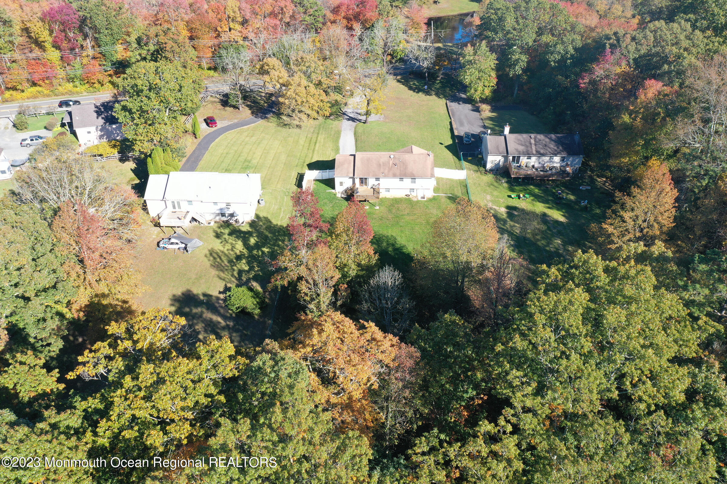 222 Leesville Road Jackson, NJ 08527 - Photo 54 of 61 a picture of street view with large trees