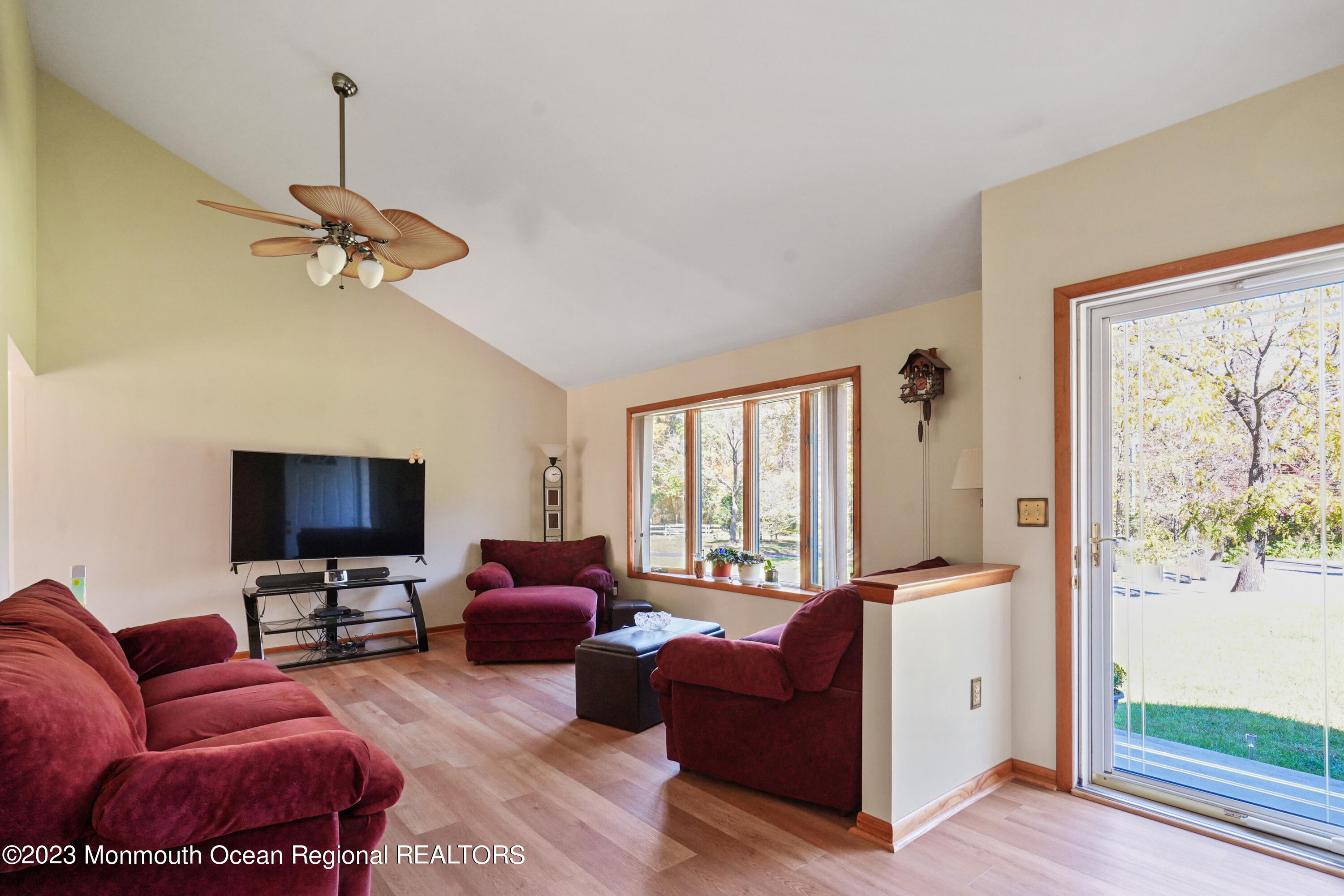 222 Leesville Road Jackson, NJ 08527 - Photo 8 of 61 a living room with furniture ceiling fan and a window
