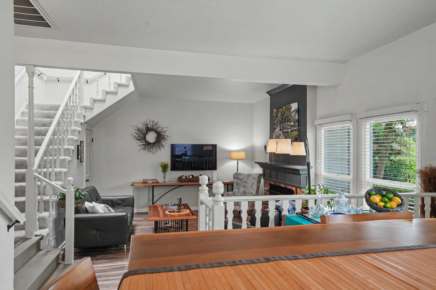 519 Clinton Road Jackson, CA 95642 - Photo 23 of 80 a living room with furniture and a flat screen tv