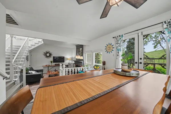 a workspace with furniture and a window