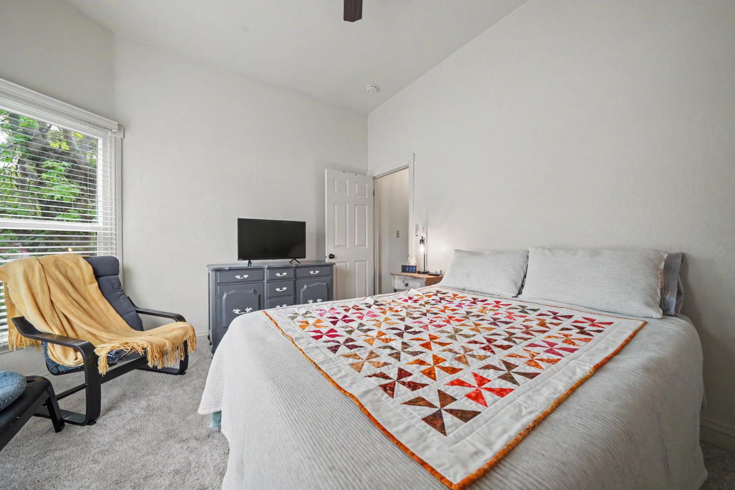 519 Clinton Road Jackson, CA 95642 - Photo 41 of 80 a bedroom with a bed and a flat screen tv