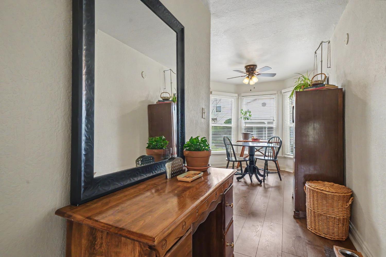 519 Clinton Road Jackson, CA 95642 - Photo 8 of 80 a view of a dining room with furniture window and wooden floor