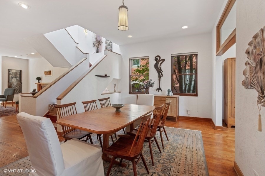 1274 West Lexington Street Chicago, IL 60607 - Photo 6 of 32 a view of a dining room with furniture and wooden floor