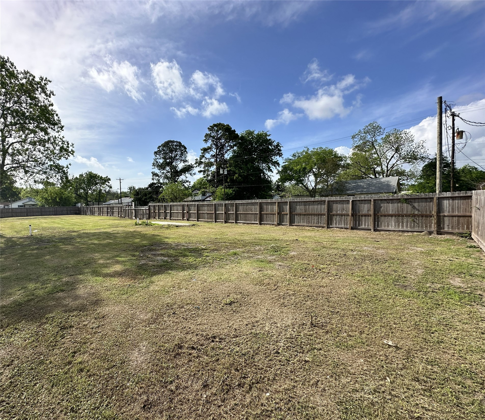 201 South 5th Street Highlands, TX 77562 - Photo 6 of 6 a view of a green field