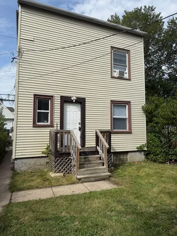 a front view of house with yard