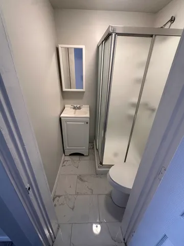 a bathroom with a sink and toilet