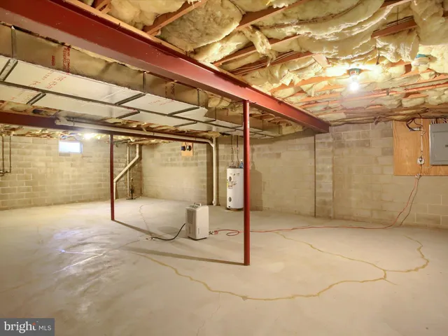 a view of a room with wooden walls