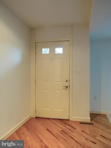 a bathroom with a sink and shower