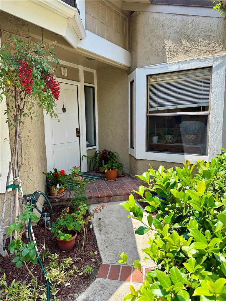 8 Coldstream Irvine, CA 92604 - Photo 4 of 27 a front view of a house with a yard