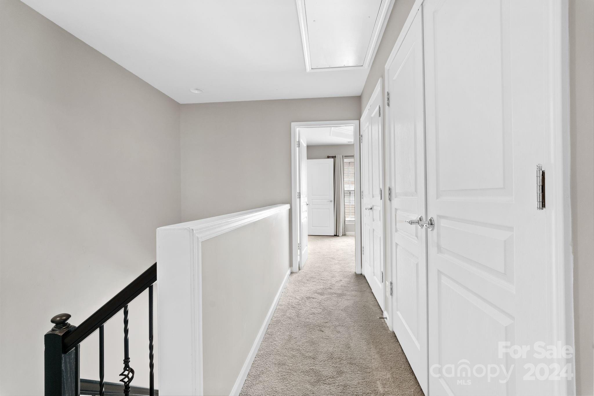 926 Lyndley Drive Fort Mill, SC 29708 - Photo 26 of 36 a view of a hallway with white walls