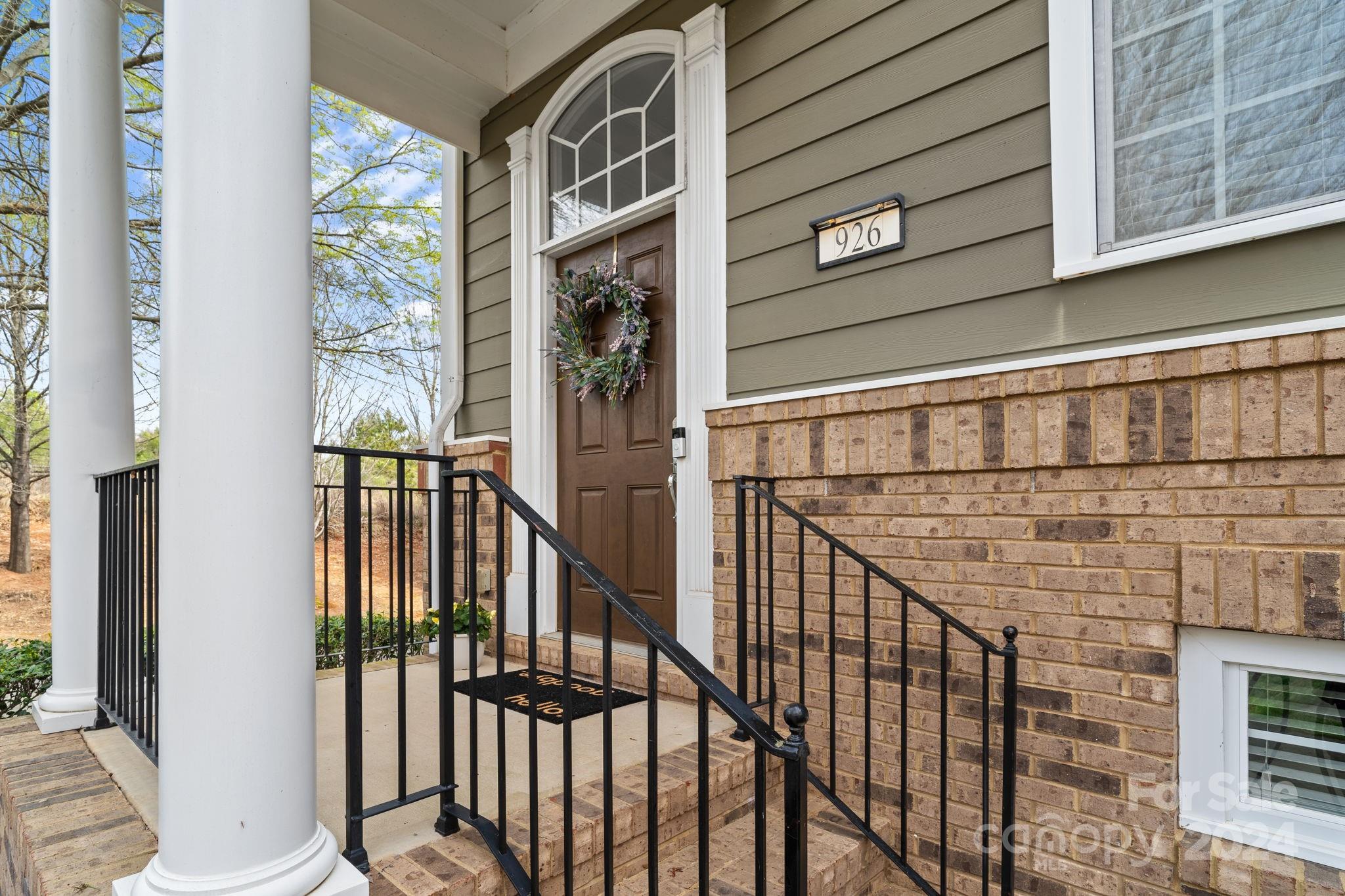 926 Lyndley Drive Fort Mill, SC 29708 - Photo 4 of 36 a view of staircase with railing and a window
