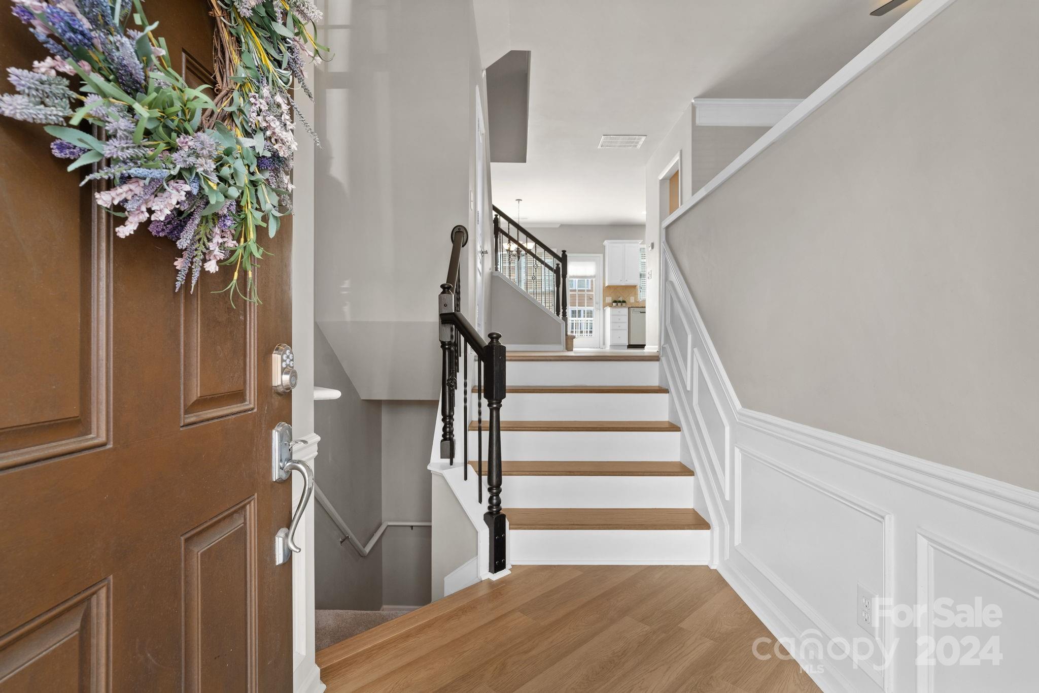 926 Lyndley Drive Fort Mill, SC 29708 - Photo 6 of 36 a view of entryway and hall with wooden floor