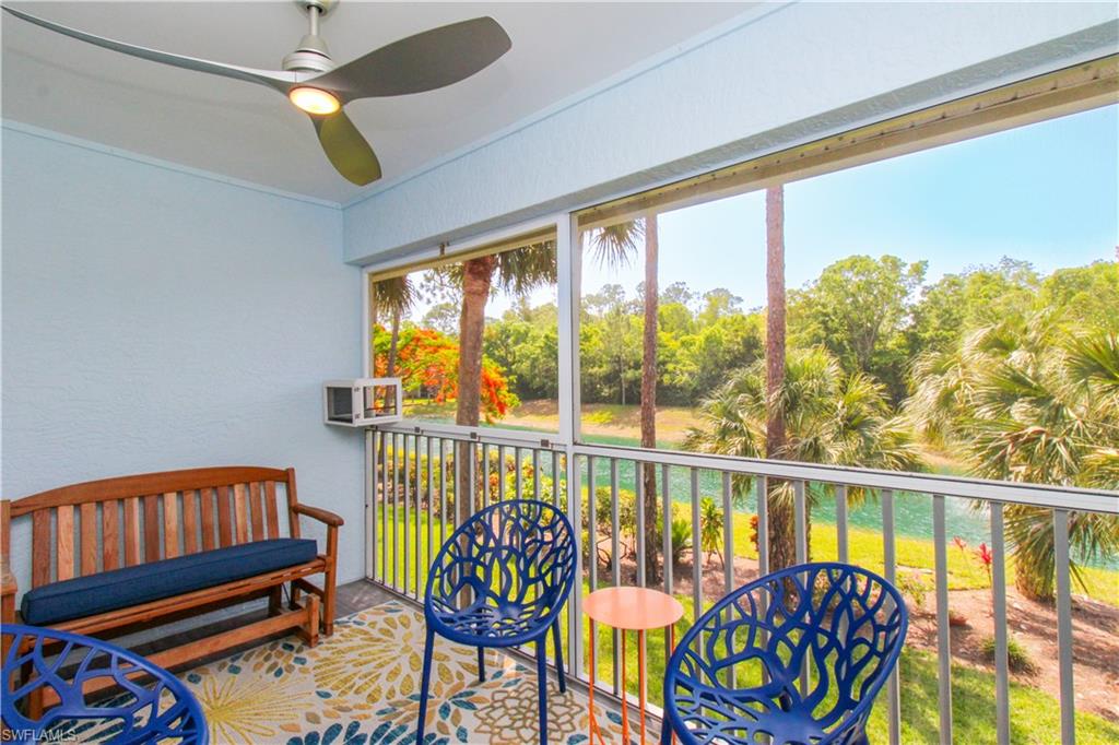 225 Robin Hood Circle, Unit 203 Naples, FL 34104 - Photo 8 of 50 Sunroom featuring ceiling fan