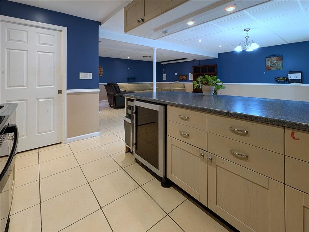 1029 Rural Ridge Drive Cheswick, PA 15024 - Photo 19 of 30 a kitchen with stainless steel appliances granite countertop a sink and cabinets