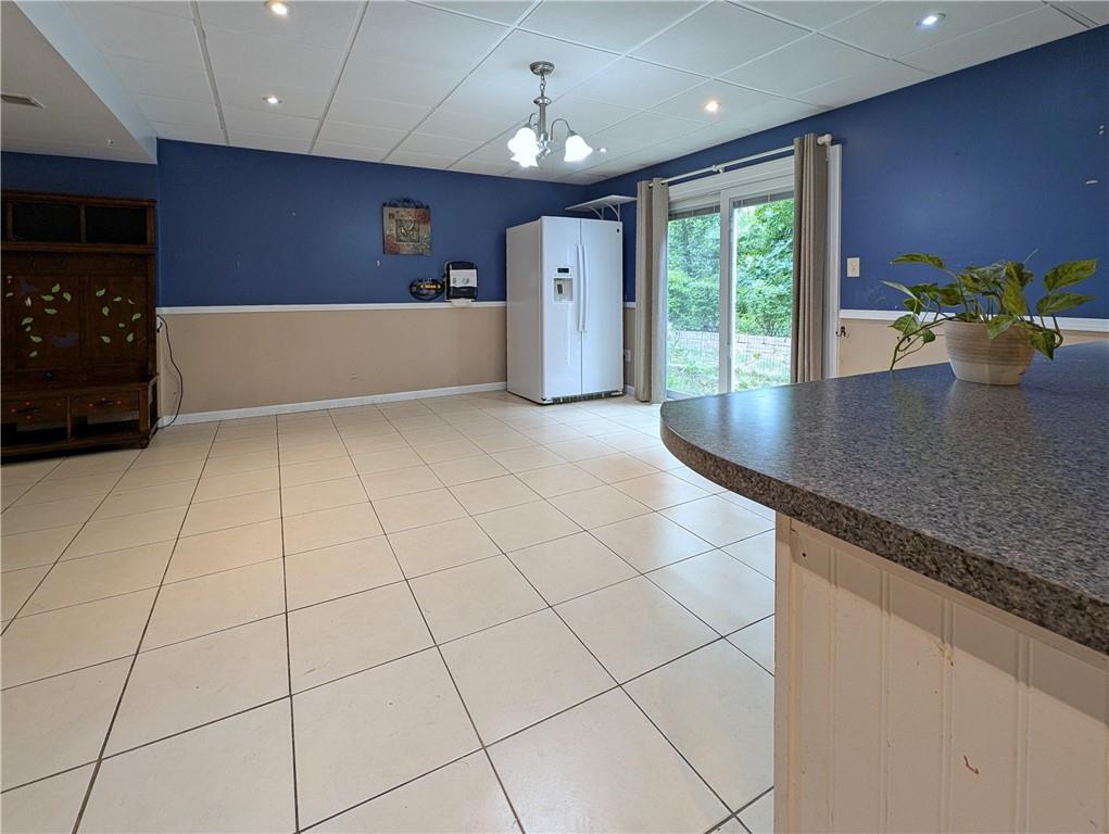 1029 Rural Ridge Drive Cheswick, PA 15024 - Photo 21 of 30 a kitchen with stainless steel appliances granite countertop a refrigerator a sink and a stove
