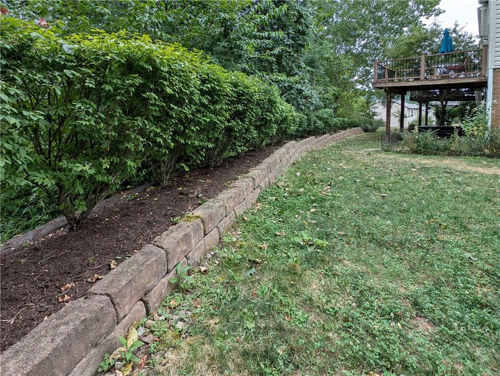 1029 Rural Ridge Drive Cheswick, PA 15024 - Photo 23 of 30 a view of backyard with table and chairs and potted plants