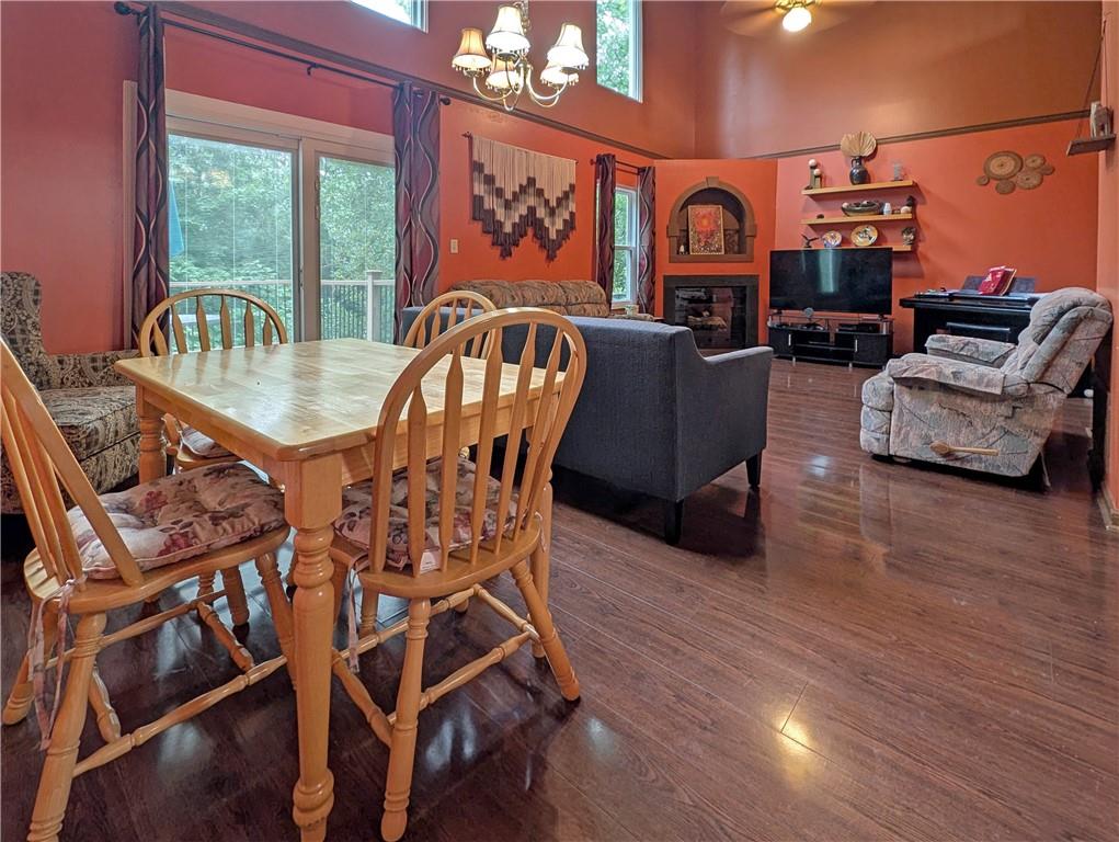 1029 Rural Ridge Drive Cheswick, PA 15024 - Photo 4 of 30 a view of a dining room with furniture window and wooden floor