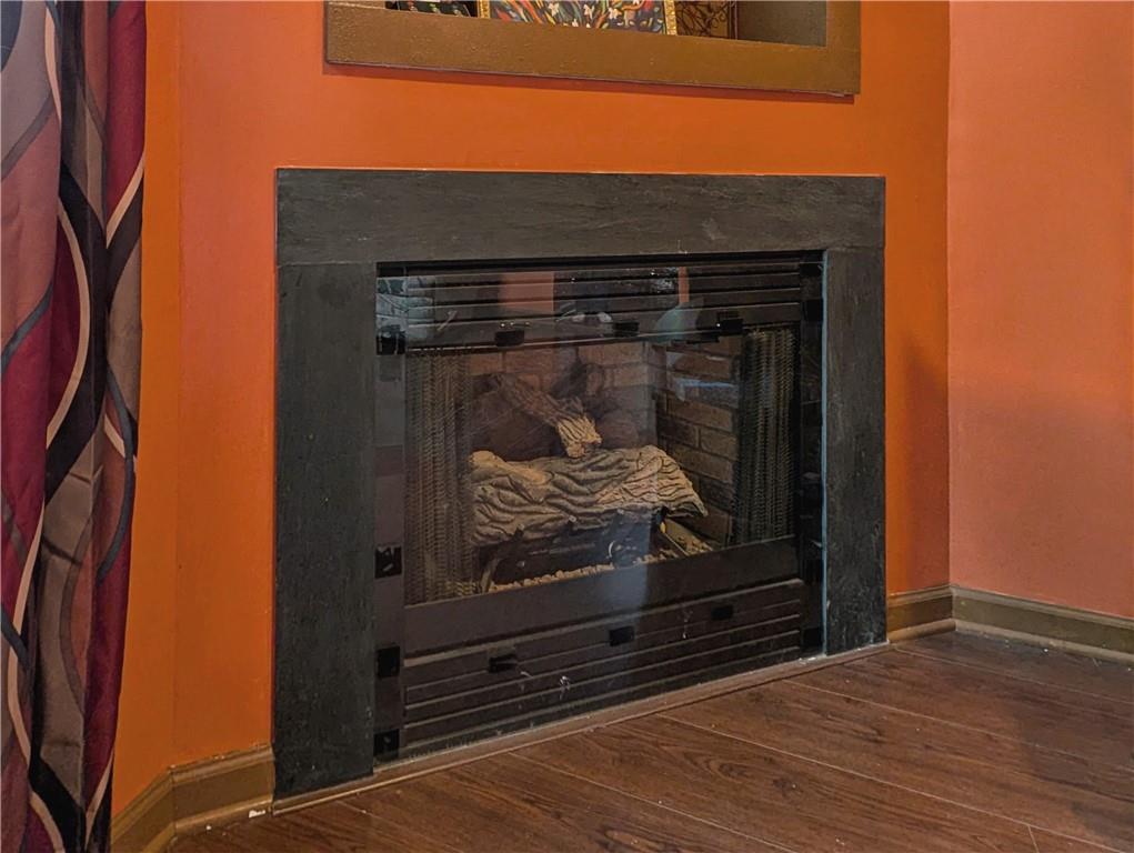 1029 Rural Ridge Drive Cheswick, PA 15024 - Photo 5 of 30 a room with fireplace and a wooden floor