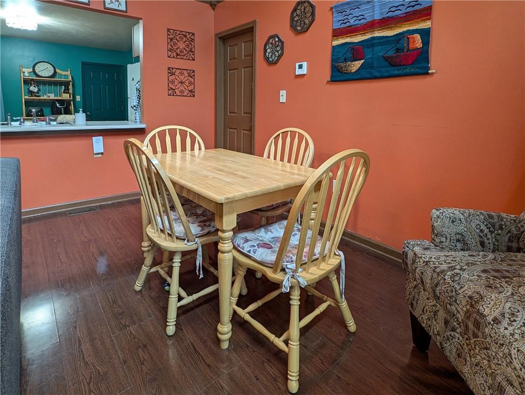 1029 Rural Ridge Drive Cheswick, PA 15024 - Photo 6 of 30 a view of a dining room with furniture and wooden floor