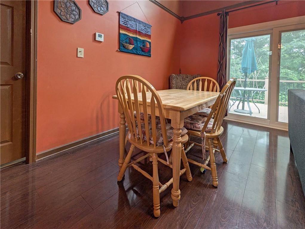 1029 Rural Ridge Drive Cheswick, PA 15024 - Photo 7 of 30 a view of a dining room with furniture window and wooden floor
