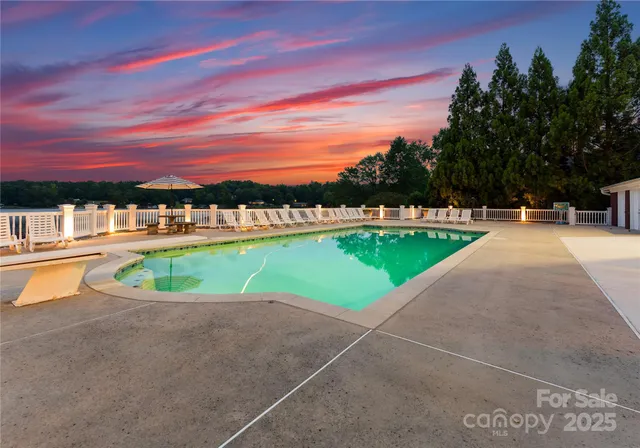 a view of a swimming pool with a sitting space