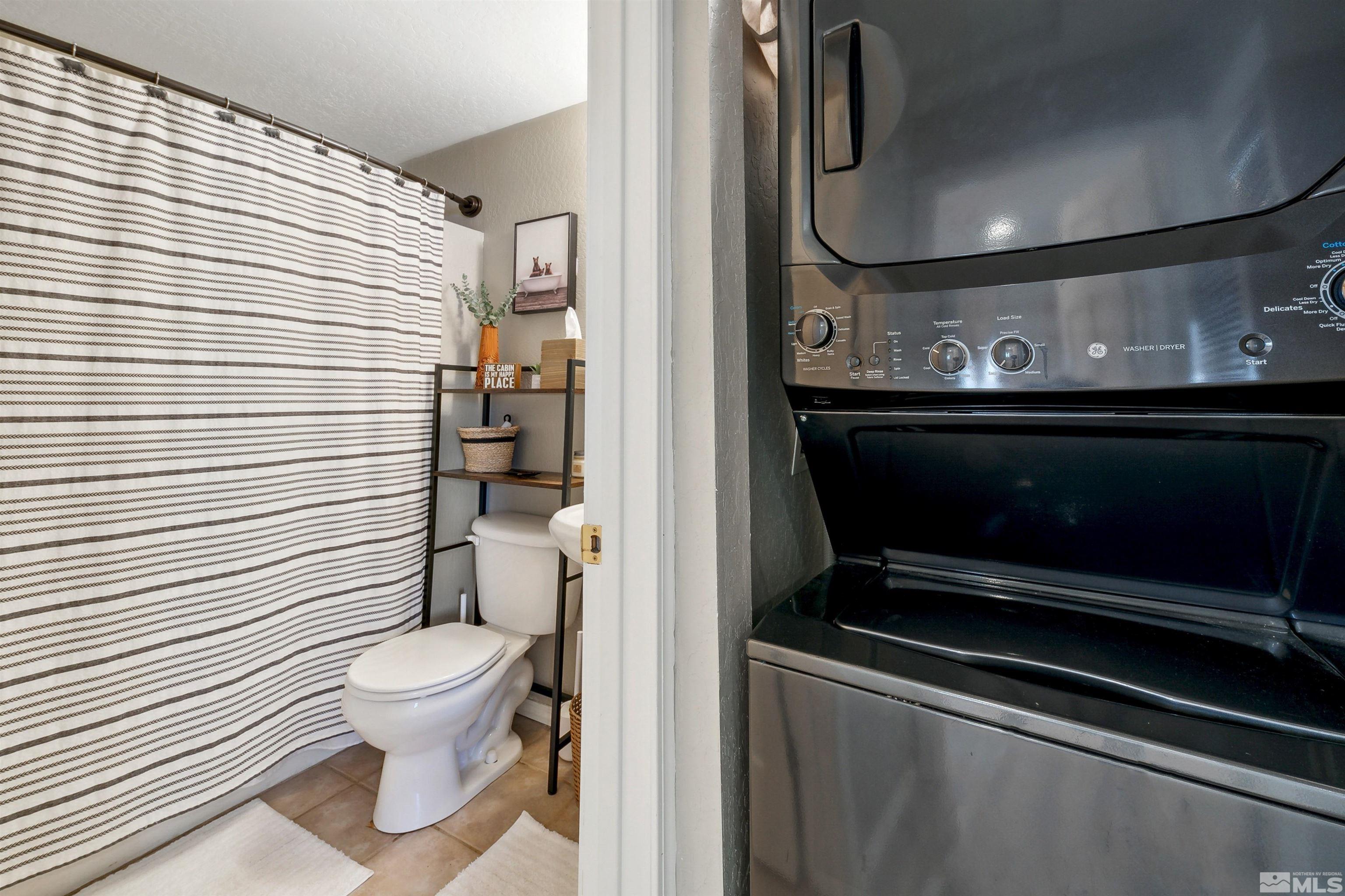 161 Tramway Drive, Unit A Stateline, NV 89449 - Photo 13 of 28 a bathroom with a toilet and a shower