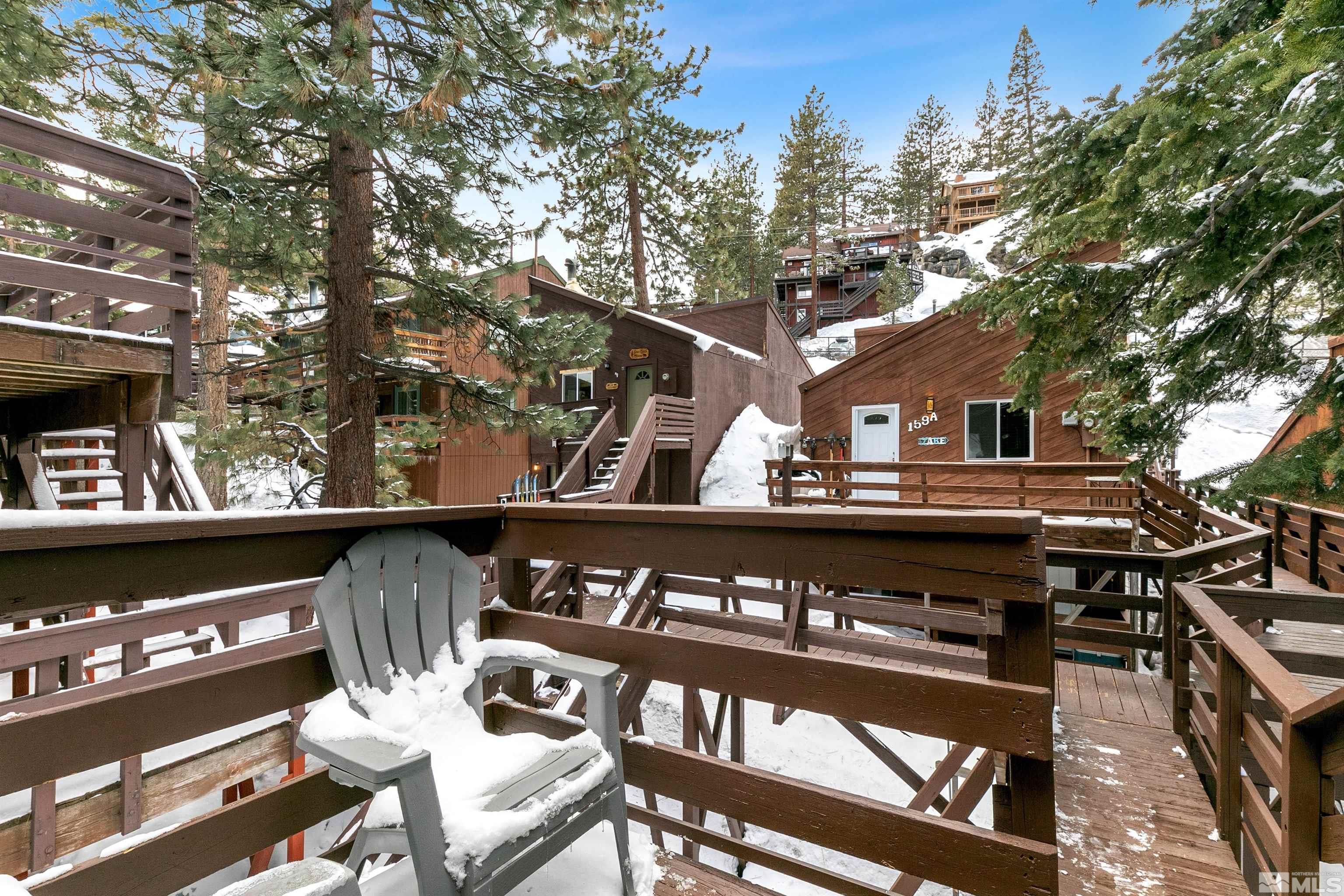 161 Tramway Drive, Unit A Stateline, NV 89449 - Photo 4 of 28 a view of a chairs and deck in the backyard