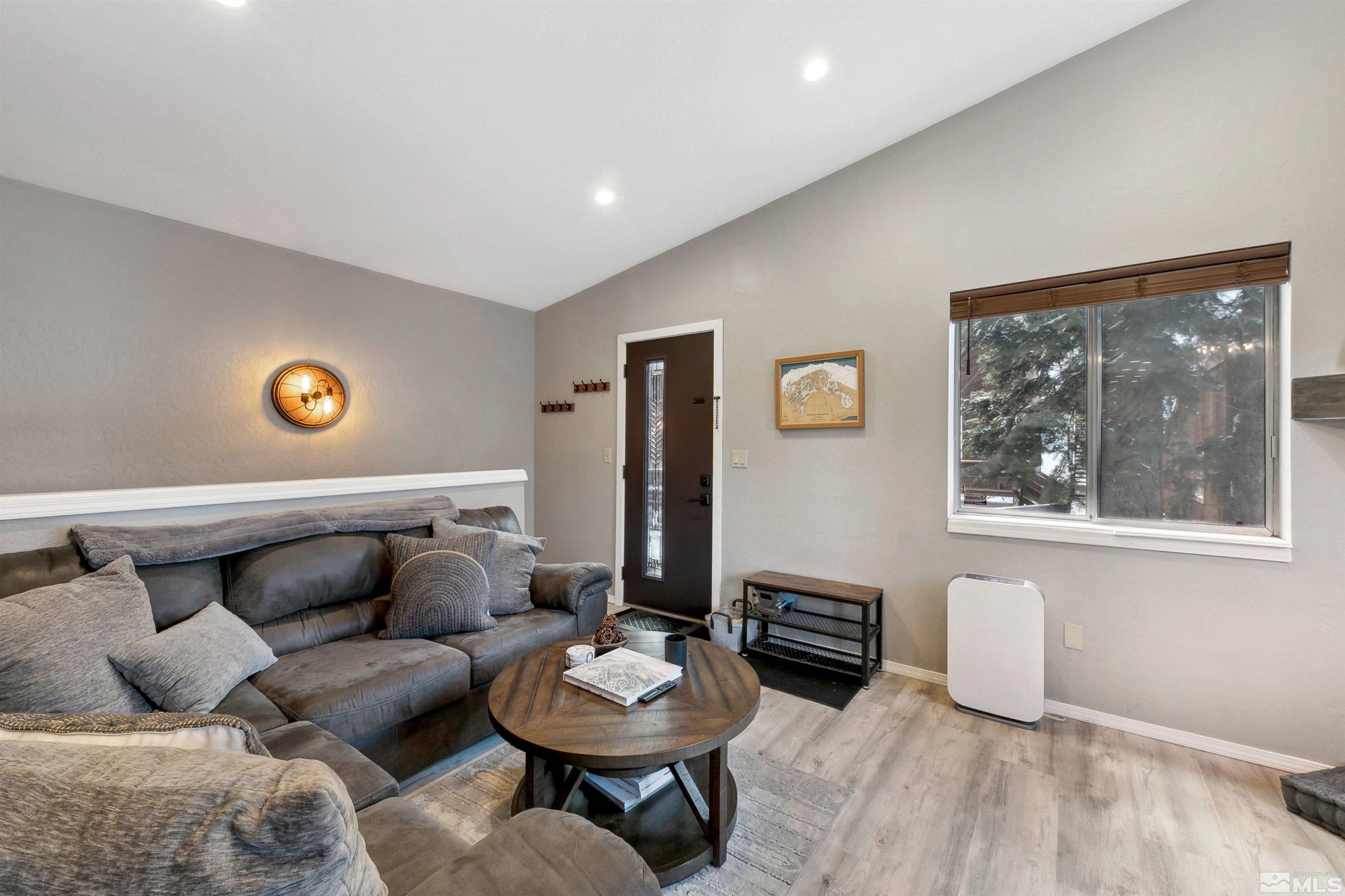 161 Tramway Drive, Unit A Stateline, NV 89449 - Photo 6 of 28 a living room with furniture and a window