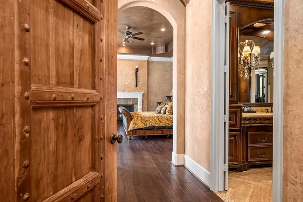 a view of bedroom with furniture and wooden floor