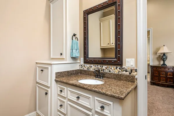 a bathroom with a toilet and a bathtub