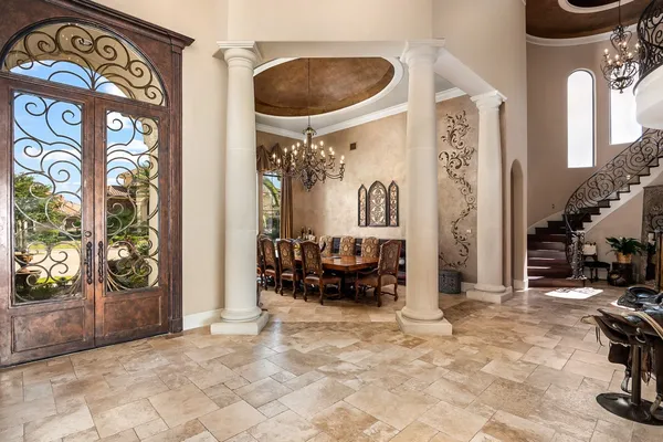a view of an entryway with furniture and rug