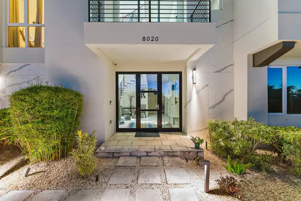 a view of a livingroom with furniture and wooden floor