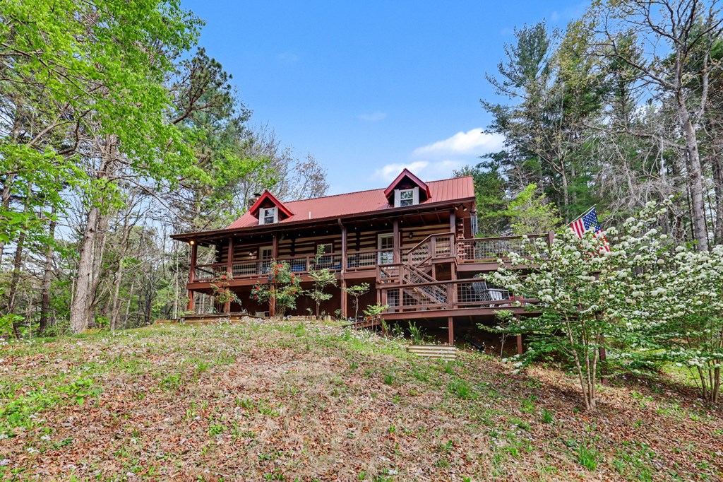 4609 Matheson Road Hiawassee, GA 30546 - Photo 45 of 57 a view of a house with a yard