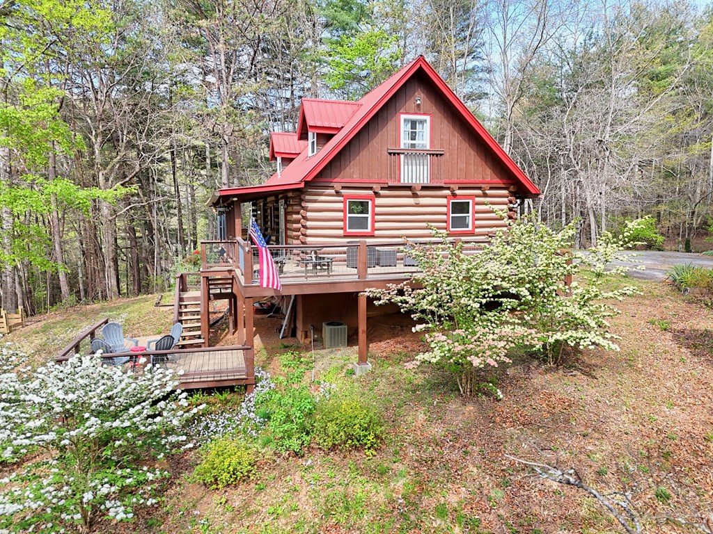 4609 Matheson Road Hiawassee, GA 30546 - Photo 53 of 57 a view of a house with a yard patio and furniture