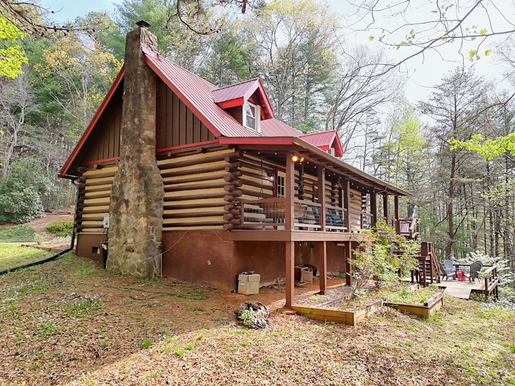 4609 Matheson Road Hiawassee, GA 30546 - Photo 54 of 57 a front view of a house with a yard