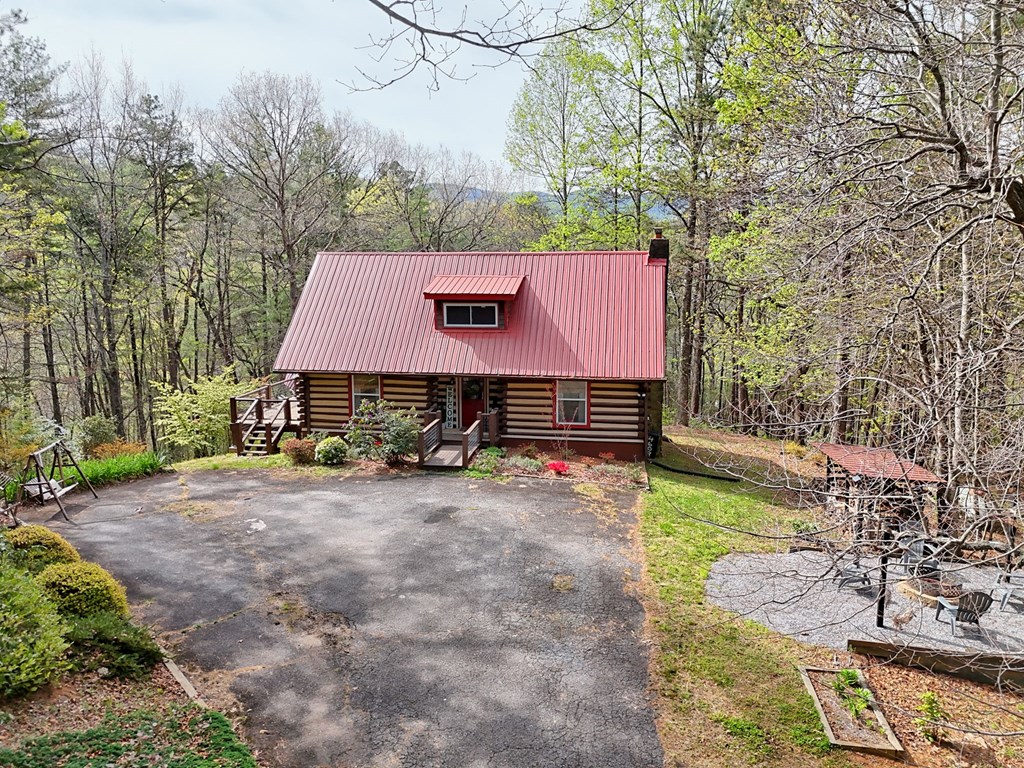 4609 Matheson Road Hiawassee, GA 30546 - Photo 57 of 57 a view of backyard of house with seating space